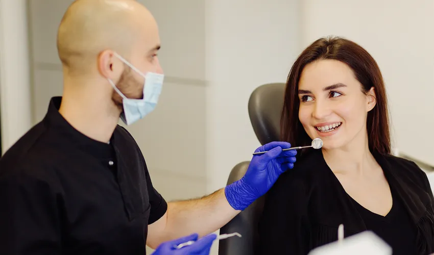 our person takign swab of a patient